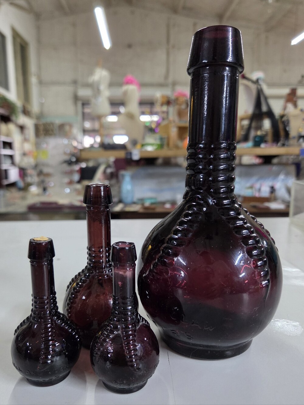 Amethyst Purple Glass Ball and Claw Bitters Bottles Wheaton Taiwan Lot of 4